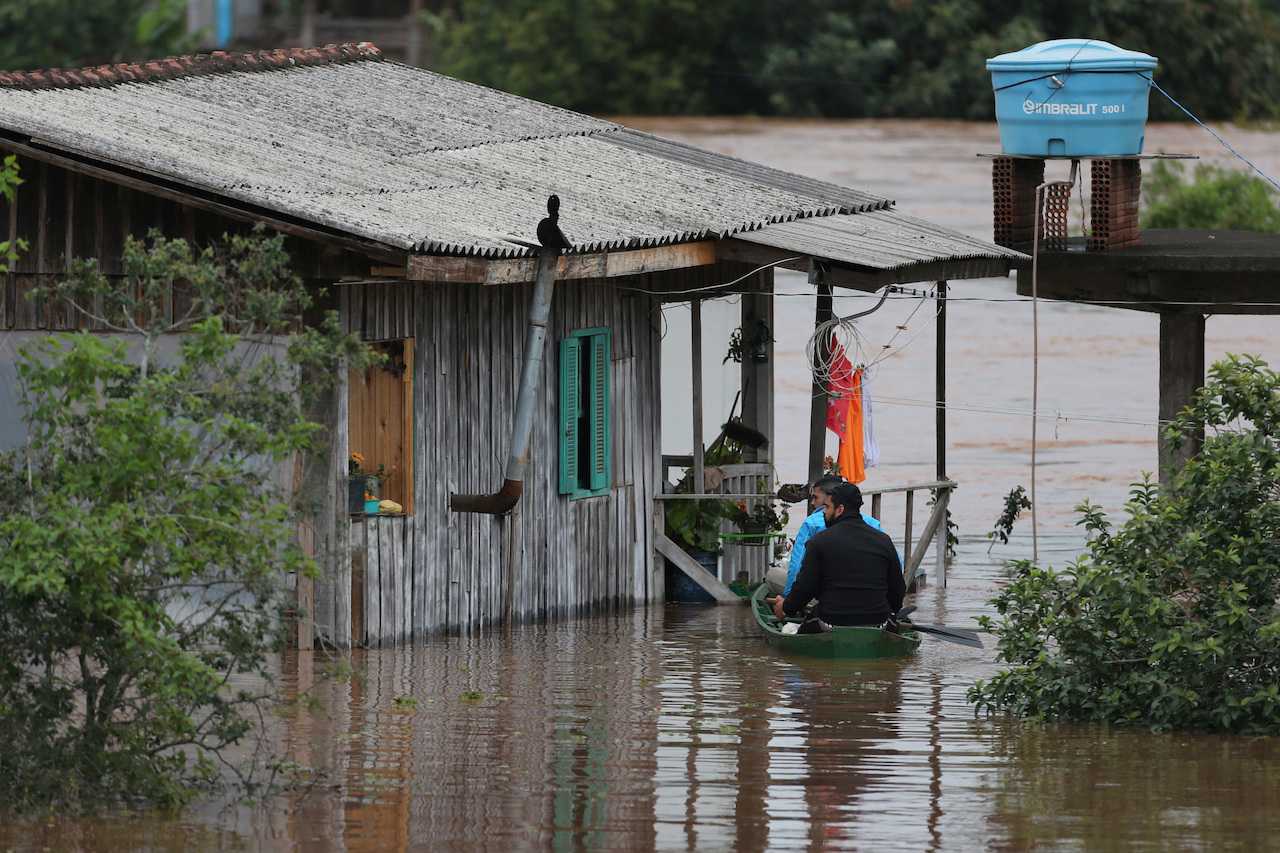 Cyclone rains in Brazil's south kill 22, leave cities completely ...