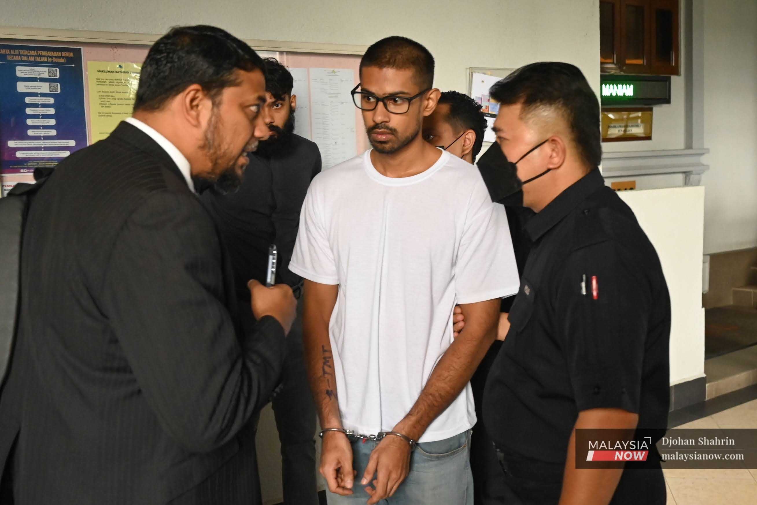 Yusoff Rawther with lawyer Rafique Rashid (left) at the Kuala Lumpur High Court, Nov 12, 2024.