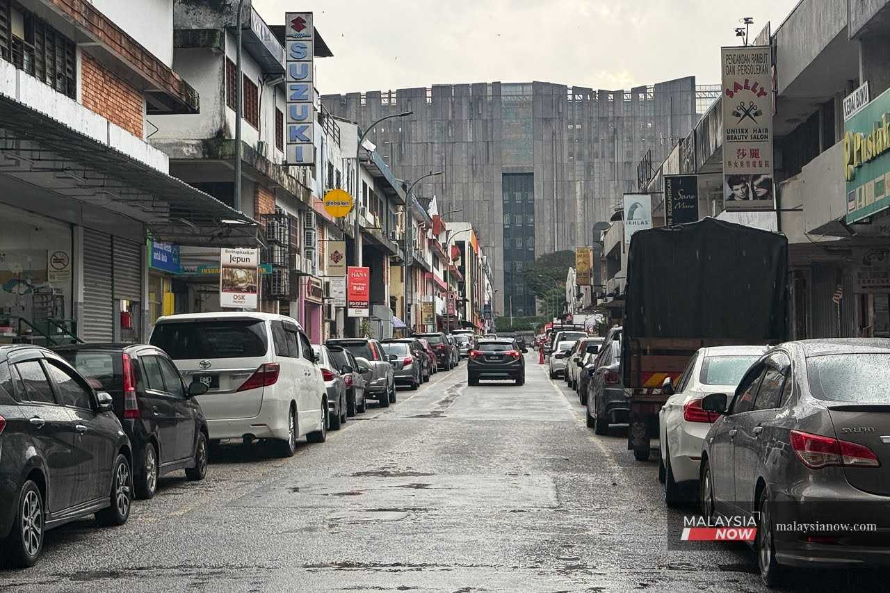 Rows of shops in a busy business district in Taman Melawati, without a flag to be seen, on Aug 30, 2025.