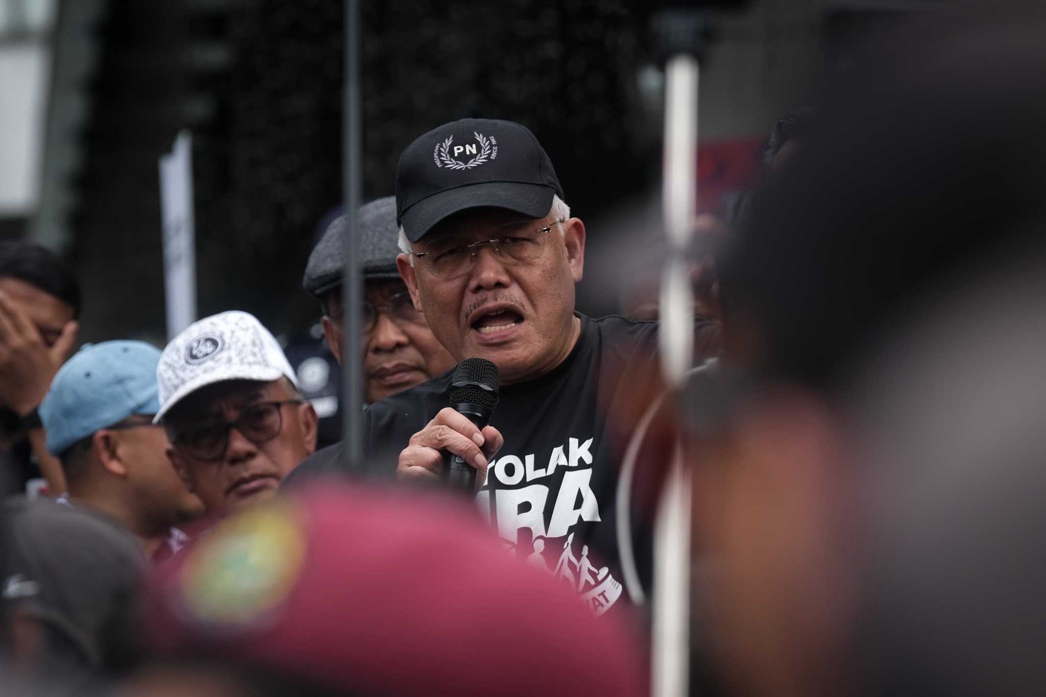 Hamzah tells Anwar to cancel Trump visit, as Putrajaya switches to Asean card amid growing protest