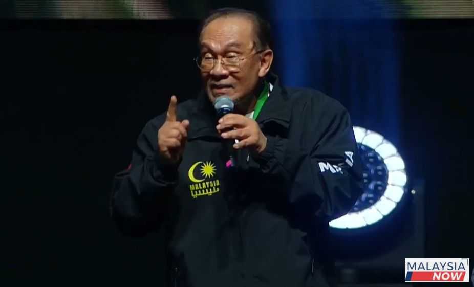 Prime Minister Anwar Ibrahim addressing a government rally for Palestine at the Axiata Arena on Oct 8, 2025.