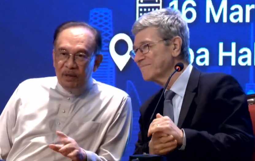 Anwar Ibrahim attends an event with US academic Jeffrey Sachs on March 16, 2026.